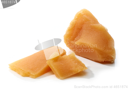 Image of caramel pieces on white background