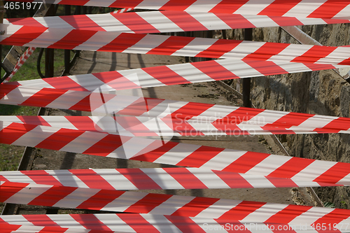 Image of red white plastic band stop