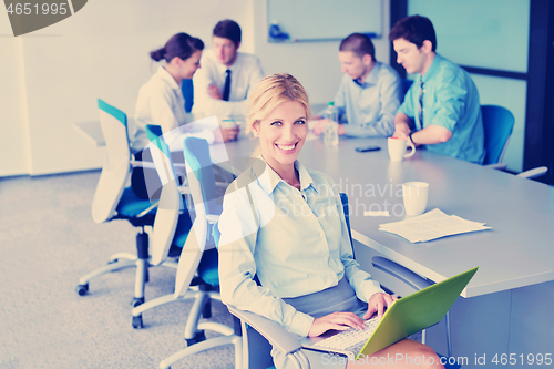 Image of business people in a meeting at office