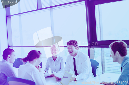 Image of business people in a meeting at office