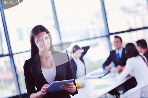 Image of business people group in a meeting at office