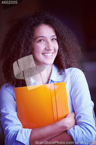 Image of young  business woman at office