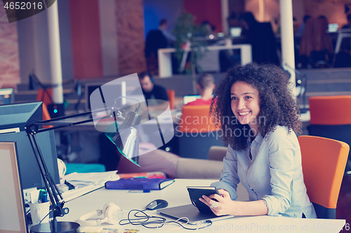 Image of young  business woman at office