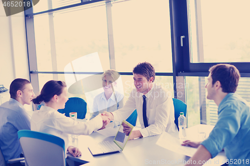 Image of business people in a meeting at office