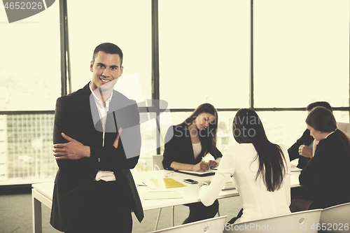 Image of business people in a meeting at office