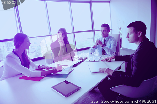 Image of business people group in a meeting at office