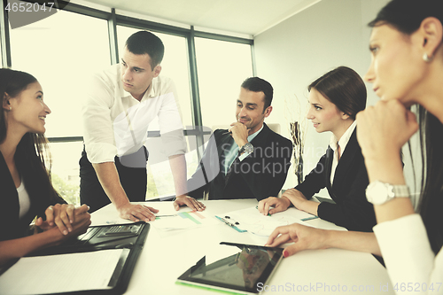 Image of business people in a meeting at office