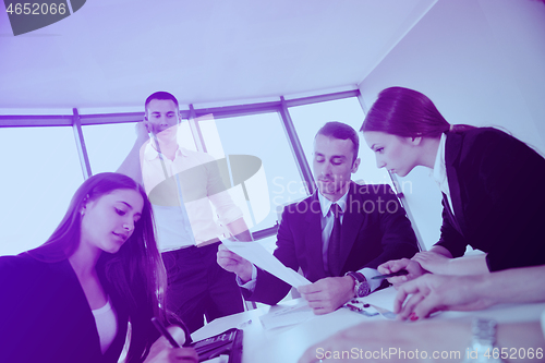 Image of business people in a meeting at office