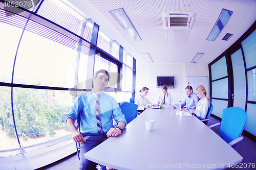 Image of business people in a meeting at office