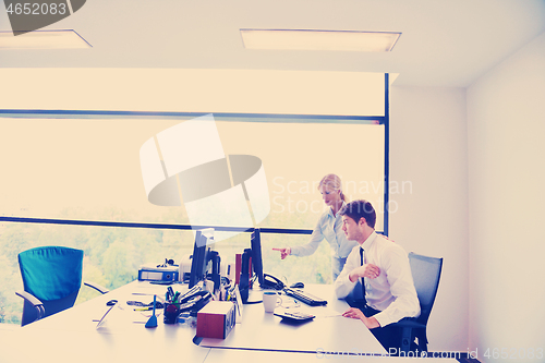 Image of business people in a meeting at office