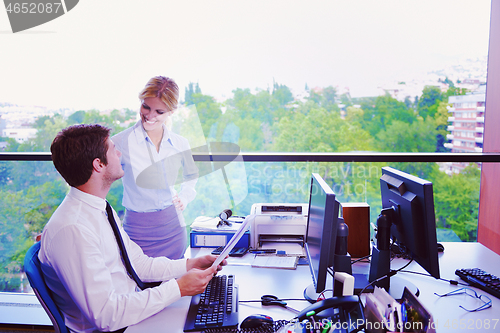 Image of business people in a meeting at office