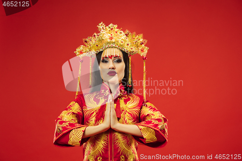 Image of Chinese traditional woman. Beautiful young girl wearing in national costume