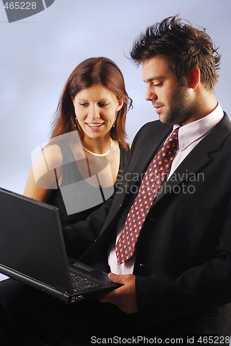 Image of Pair with a notebook