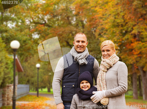 Image of happy family in autumn park