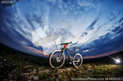 Image of small parts of bike at the evening