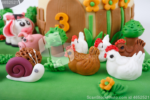 Image of birthday cake with farm marzipan animals