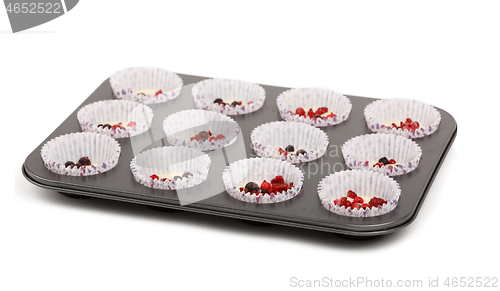 Image of raw homemade Muffin isolated on white background