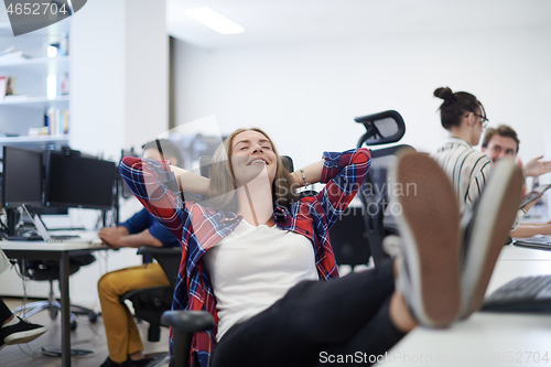 Image of business woman taking a break from work