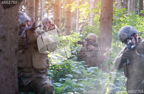 Image of Modern warfare Soldiers  Squad  in battle