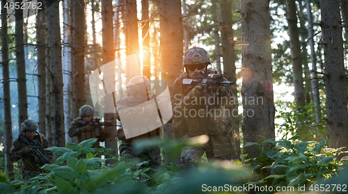 Image of Modern warfare Soldiers  Squad  in battle