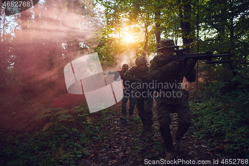 Image of Modern warfare Soldiers  Squad  in battle