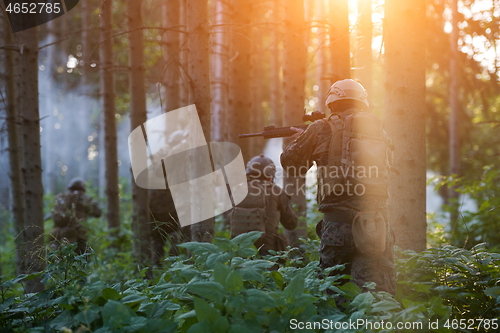 Image of Modern warfare Soldiers  Squad  in battle