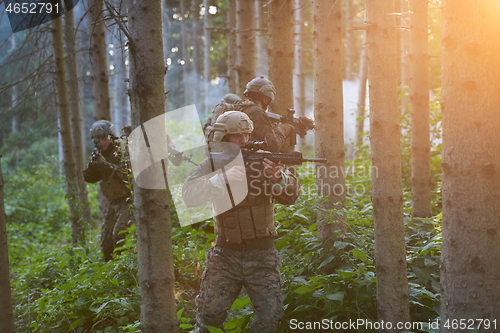 Image of Modern warfare Soldiers  Squad  in battle