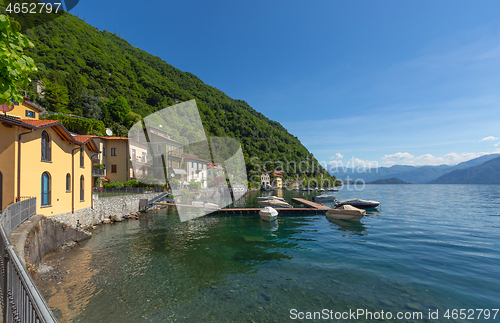 Image of Como lake between mountains in Italy