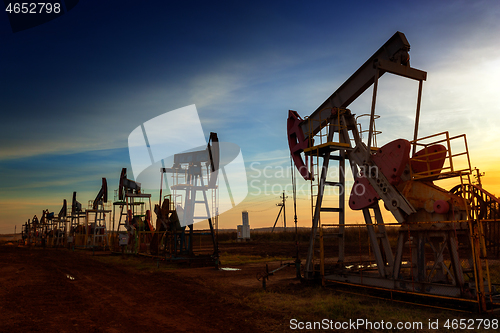 Image of Many working oil pumps silhouette