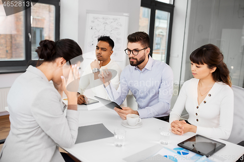 Image of recruiters having job interview with employee