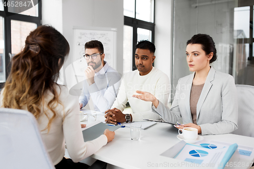 Image of recruiters having job interview with employee