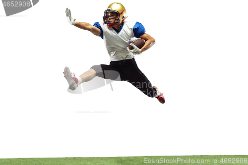 Image of American football player in action isolated on white studio background