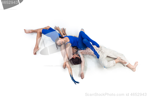 Image of The group of modern dancers, art contemp dance, blue and white combination of emotions