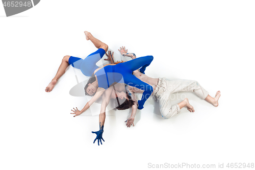 Image of The group of modern dancers, art contemp dance, blue and white combination of emotions