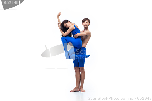 Image of The couple of modern dancers, art contemp dance, blue and white combination of emotions