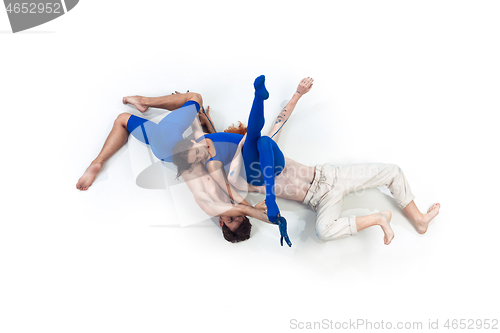 Image of The group of modern dancers, art contemp dance, blue and white combination of emotions