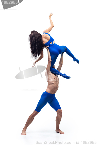 Image of The couple of modern dancers, art contemp dance, blue and white combination of emotions