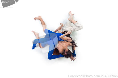 Image of The group of modern dancers, art contemp dance, blue and white combination of emotions