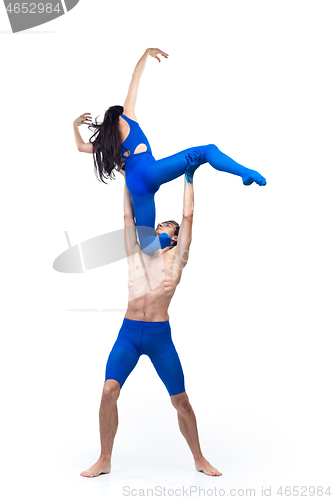 Image of The couple of modern dancers, art contemp dance, blue and white combination of emotions