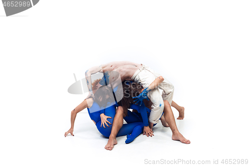 Image of The group of modern dancers, art contemp dance, blue and white combination of emotions