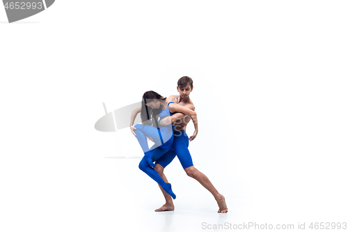 Image of The couple of modern dancers, art contemp dance, blue and white combination of emotions