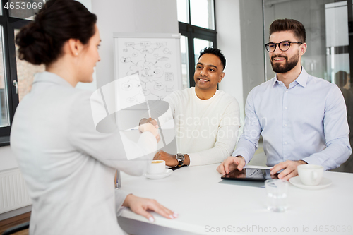 Image of recruiters having interview with employee