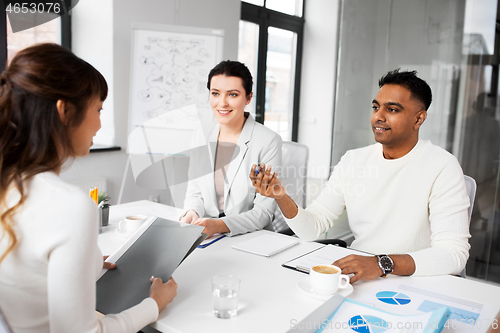 Image of recruiters having job interview with employee