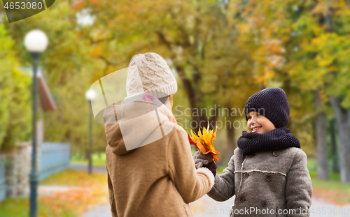 Image of smiling children in autumn park