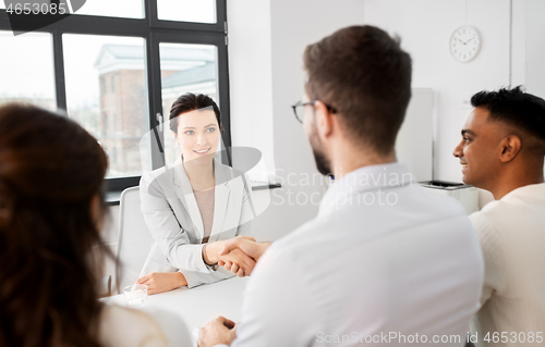 Image of recruiters having interview with employee