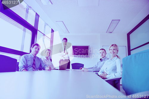 Image of business people in a meeting at office