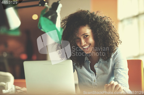 Image of young  business woman at office