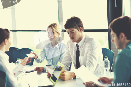 Image of business people in a meeting at office