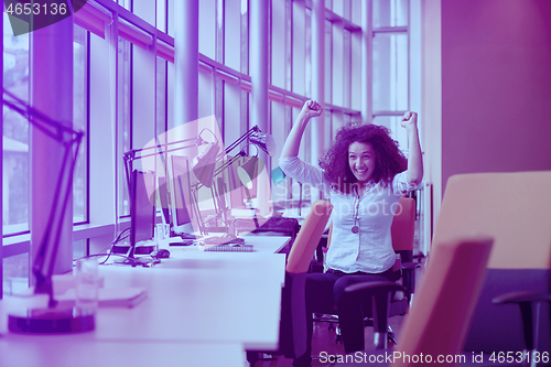 Image of young  business woman at office