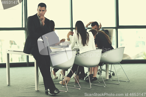 Image of business people group in a meeting at office